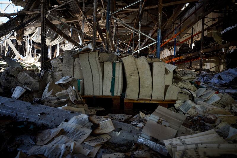 Burnt books are seen in a damaged workshop of Ukraine’s largest printing house in Kharkiv. Photograph: Ukrainian Presidential Press Office via AP