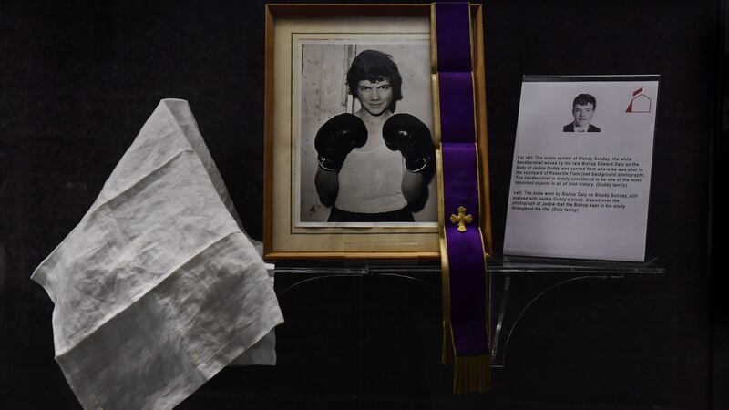 The white hankerchief, waved by Bishop Edward Daly as the body of 17-year-old Jackie Duddy was carried from the Rossville Flats area is displayed alongside a framed photograph of him in the Museum of Free Derry in  Derry. Photograph: Charles McQuillan/Getty Images