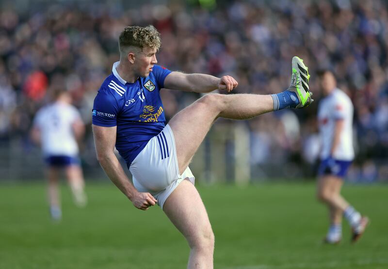 Cavan's Paddy Lynch kicks a point out of his vital total of 1-9 in the Ulster SFC game in Clones. Photograph: John McVitty/Inpho