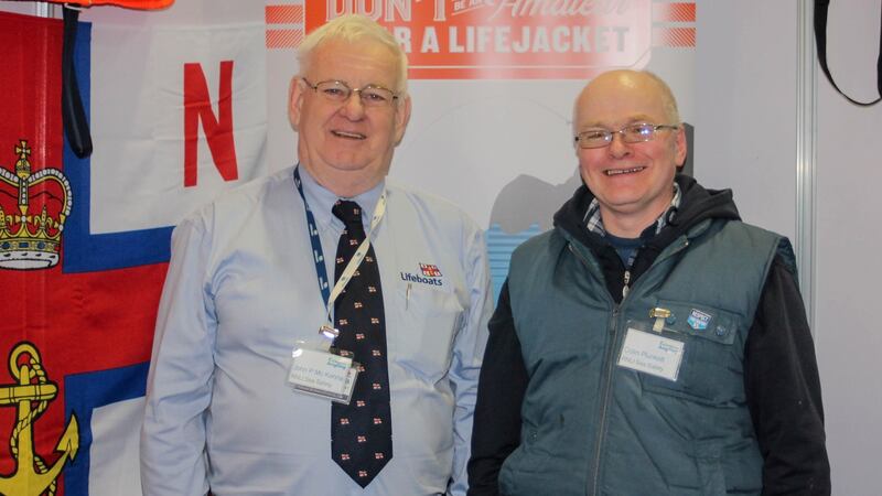 Howth RNLI coastal safety officer John McKenna (left) with Colm Plunkett at the Ireland angling show
