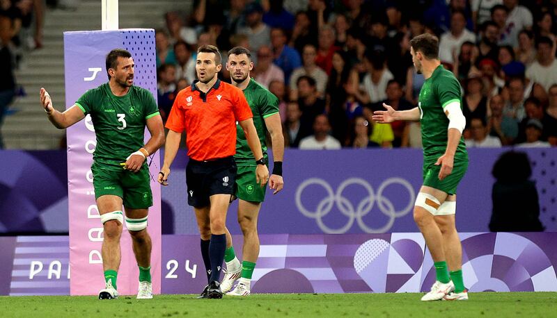 Ireland captain Harry McNulty challenges the referee after Fiji's match-winning score during the Men's Sevens quarter-final at Stade de France. Photograph: Ryan Byrne/Inpho