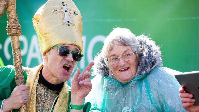 Irene Mullally from Bangor pictured with “St Patrick” at the Dublin parade. Photograph: Tom Honan