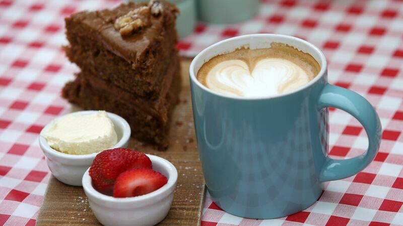 Coffee cake with a latte at the Hazel House cafe. Photograph: Laura Hutton