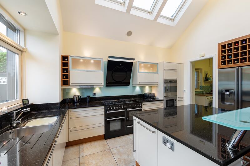 The kitchen/dining area opens out to the back garden. It’s as if the place was only finished recently.