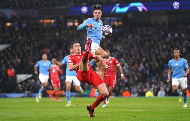 Manchester City's Jack Grealish (right) and Bayern Munich's Benjamin Pavard battle for the ball during the UEFA Champions League quarter-final first leg match at Etihad Stadium, Manchester. Photograph: Tim Goode/PA