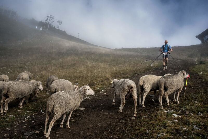 An Ultra-trailer in La Flegere path (col de la Flegere) on September 3rd, 2017 near Chamonix, as he competes during the 15th edition of the Mount Blanc Ultra Trail.