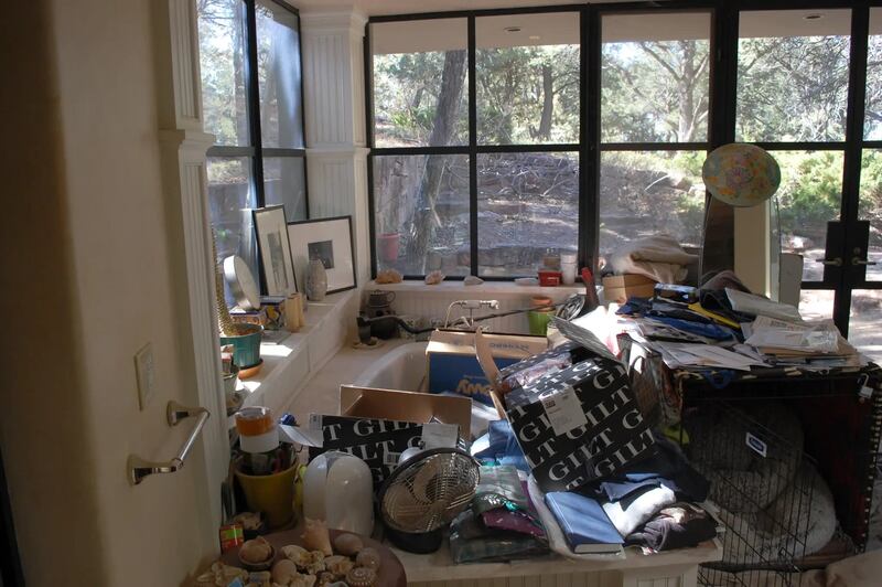 Clutter fills one of teh baths in the home of Gene Hackman and Betsy Arakawa. Photograph: Santa Fe County Sheriff’s Office