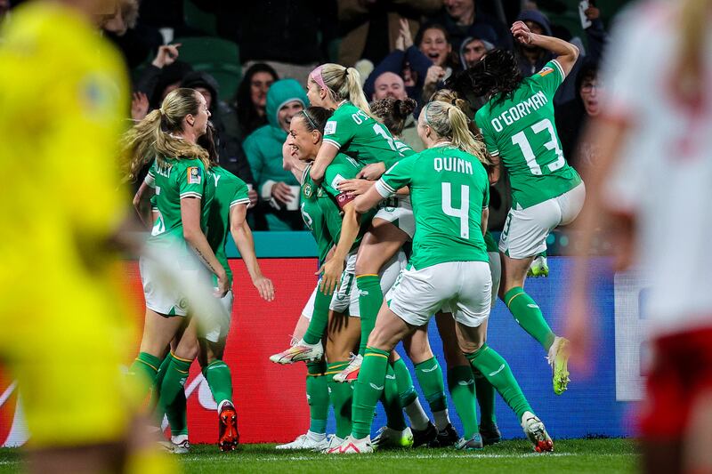 Katie McCabe celebrates with her team-mates after scoring the Republic of Ireland's first goal against Canada in Perth in July. Photograph: Ryan Byrne/INPHO