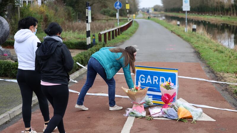 Locals leave flowers near the scene of the murder of Ashling Murphy, on the banks of the Grand Canal, in Tullamore, Co Offaly. Photograph: Dara Mac Dónaill