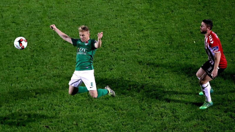 Cork’s Conor McCormack and Rory Patterson of Derry. Photograph: Bryan Keane/Inpho