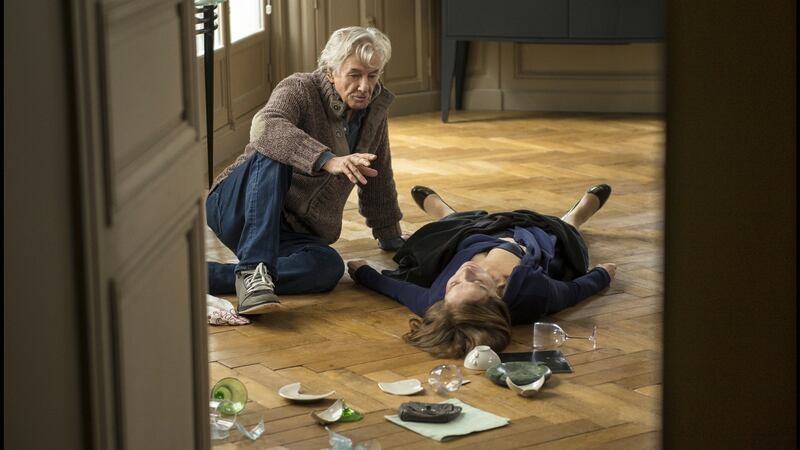 Paul Verhoeven with Isabelle Huppert on the set of ‘Elle’