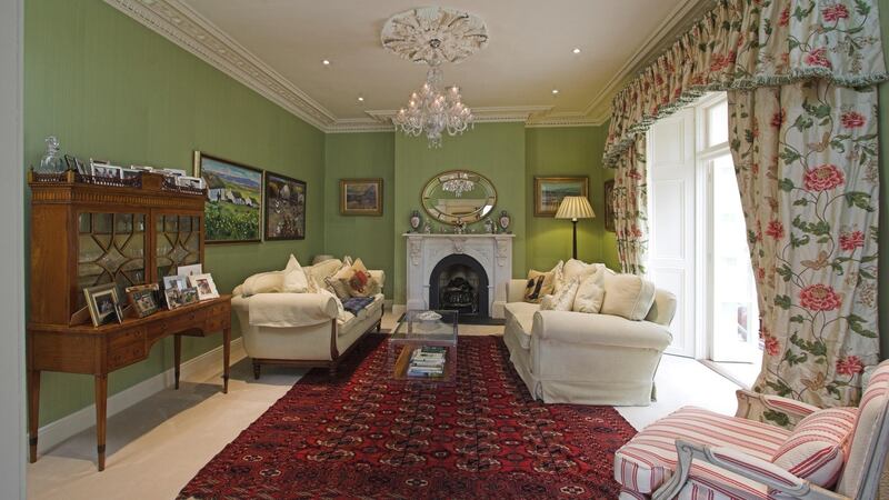 Restored in period style, with marble fireplaces and some ornate cornicing, the house also has all the modern comforts.