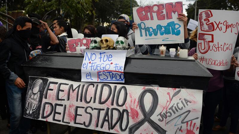 Guatemalan University students take part in a protest demanding justice for the girls killed in  the  state-run shelter fire in March 2017. Photograph: Johan Ordonez/AFP/Getty Images