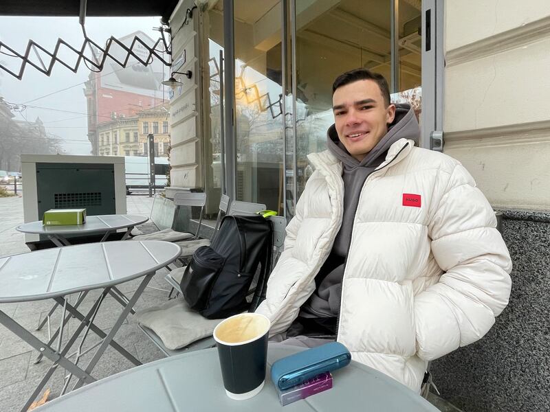 Maks Leonov, a Kyiv law student who also works with cryptocurrency, in a Lviv cafe