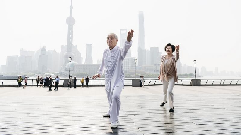 A  Chinese couple doing Tai Chi on The Bund in Shanghai. Photograph: iStock