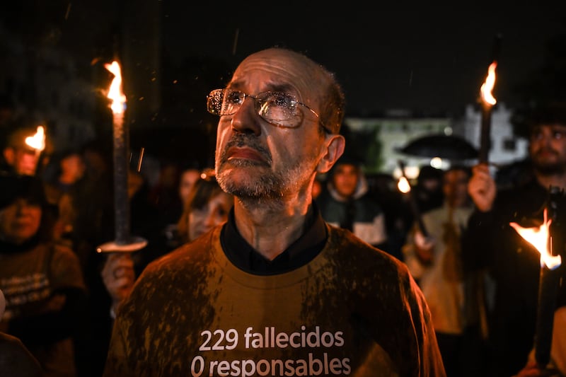A man wearing a t-shirts reading "229 victims" in memory of those killed in the 2024 floods on October 29th, 2025, in Valencia. Photograph: David Ramos/Getty Images