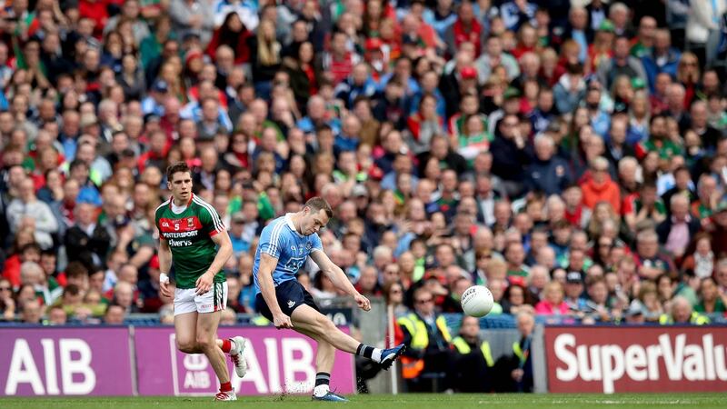 Dean Rock kicking the winning point against Mayo in   the 2017 All-Ireland  final in  Croke Park. Photograph: Ryan Byrne/Inpho