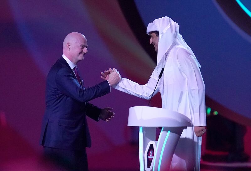Fifa president Gianni Infantino and Qatar Emir Tamim bin Hamad Al Thani: the old Fifa regime that made the award has been widely discredited in the years since 2010 and  Infantino, has talked about "money disappearing" from the organisation. 