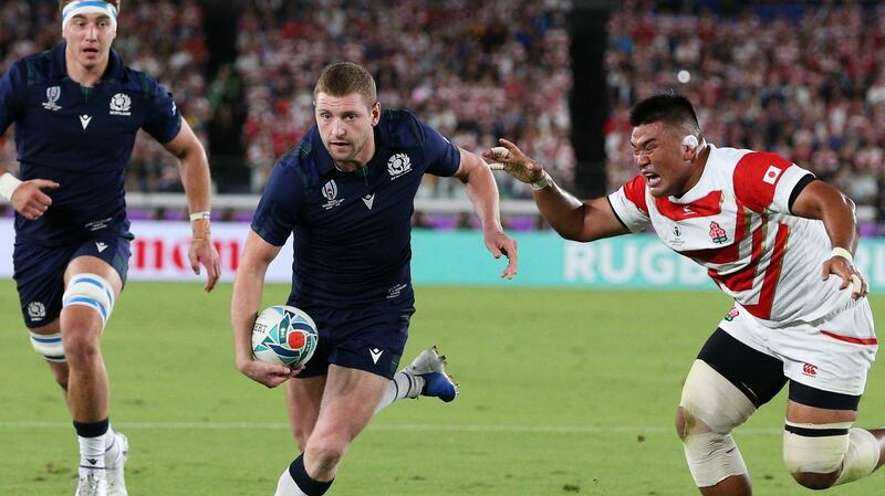 Finn Russell scores a try for Scotland at the 2019 Rugby World Cup match against Japan. File photograph: Craig Mercer/Inpho