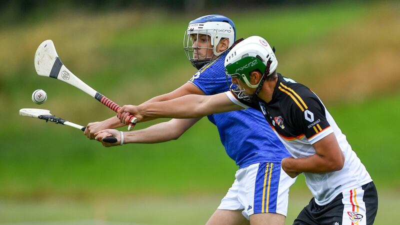 Magnani Ugo of Europe Harps in action against Lauritz Bonnen of Germany. Photograph: iaras Ó Mídheach/Sportsfile