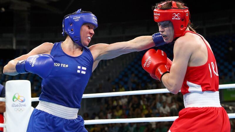 Katie Taylor in action against Finland’s Mira Potkonen in the lightweight women’s quarter-finals in Rio. Photograph:  Yves Herman/Reuters