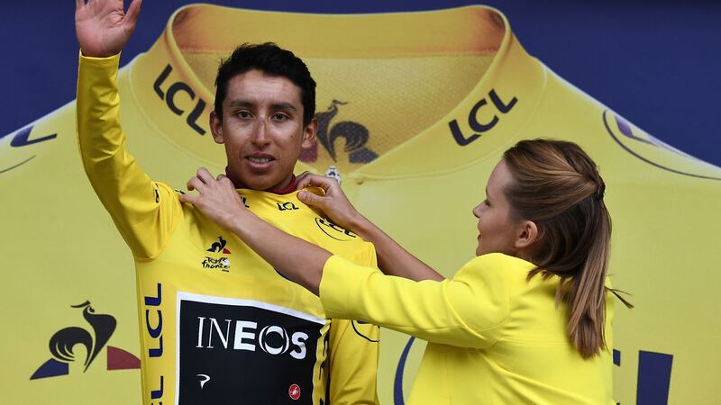 Colombia’s Egan Bernal  celebrates after receiving the  yellow jersey on the podium after stage 19  of the Tour de France  between Saint-Jean-de-Maurienne and Tignes. Photograph:  Anne-Christine Poujoulat/AFP/Getty Images