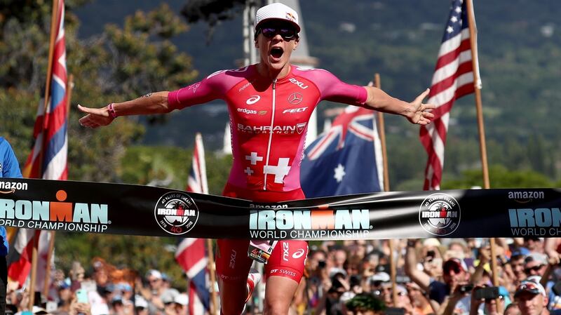 Daniela Ryf of Switzerland celebrates after setting the course record of 8:26:16 to win the Ironman World Championships in October, 2018 in  Kailua Kona, Hawaii. Photograph: Al Bello/Getty Images for Ironman