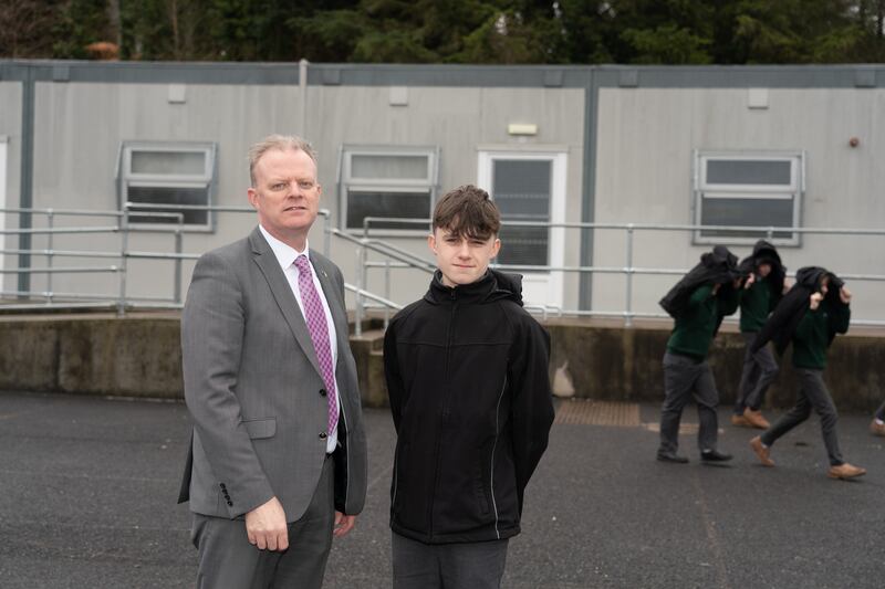 Tom Carry, pictured with principal Brian Goggins, fronted a media campaign for a new school. Photograph: Barry Cronin