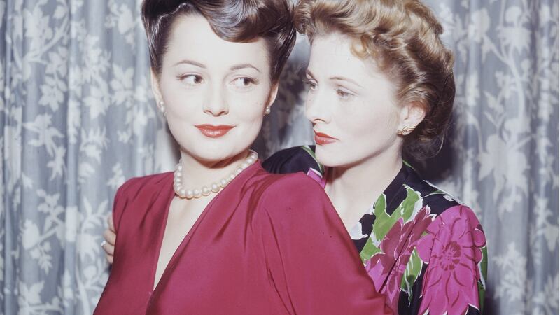 Actress Olivia de Havilland (left) with her sister Joan Fontaine, circa 1945. Photograph: Silver Screen Collection/Getty Images