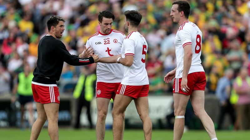Tyrone players celebrate the win over Donegal. Monaghan have the better starting team but Tyrone have more options to call on when the game is in the balance. Photograph: Laszlo Geczo/Inpho