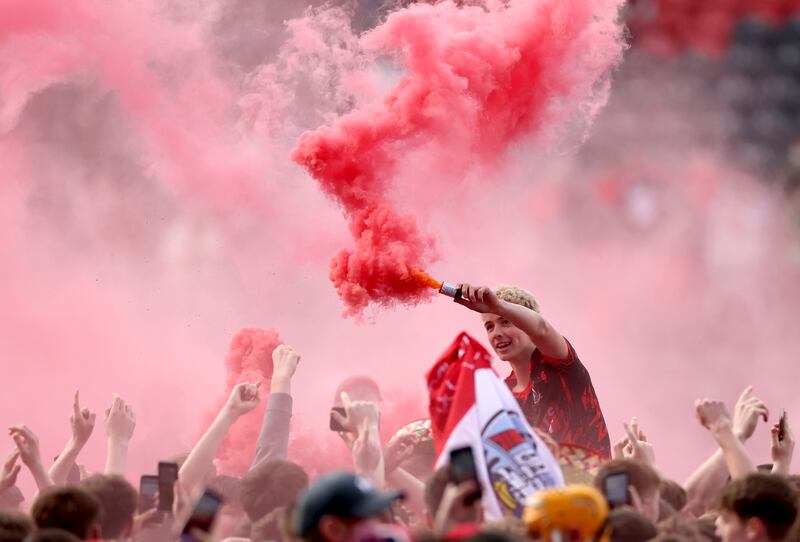 Cork fans celebrate. Photograph: James Crombie/Inpho