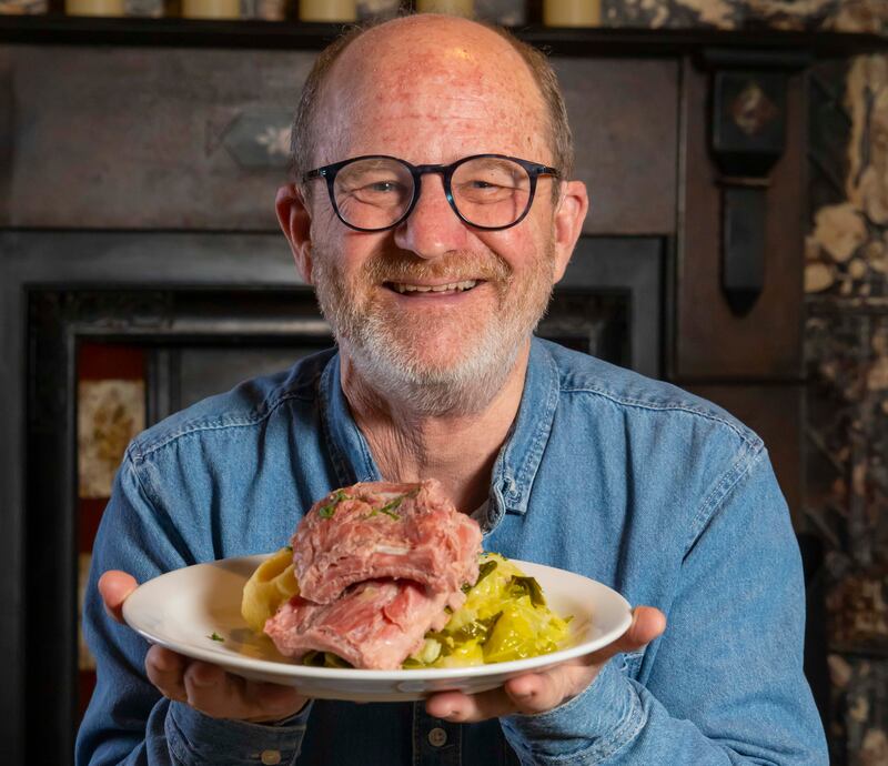 Russ Parsons at The Cove Bar, Waterford city with a plate of bacon ribs with mash potatoes and cabbage with parsley sauce. Photograph: Patrick Browne