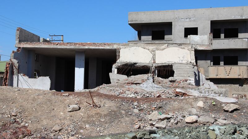 A house in Cudi, Cizre,  badly damaged in the military operation by Turkish forces last year. Many families in the area have abandoned their homes since the conflict. Photograph: Stephen Starr