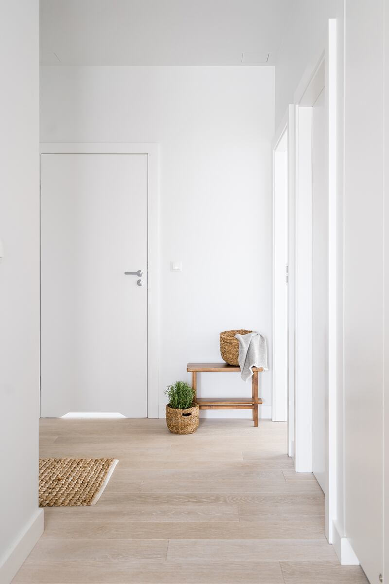 When painted in the same colour as the surrounding walls, doors can create a seamless visual flow. Photograph: iStock