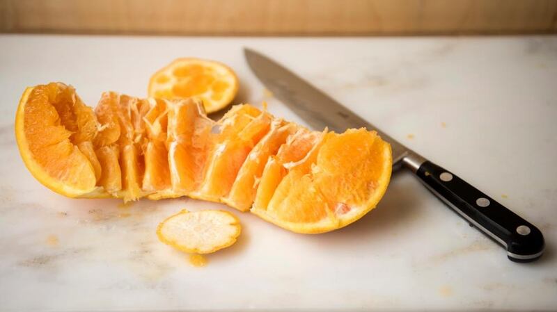 Three cuts and you can make a concertina orange. Photograph: Linda Nylind/The Guardian