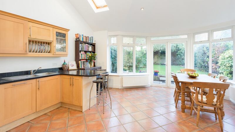 10 Castlepark Road, Sandycove, Co Dublin: The kitchen-diner is  a bright space with a vaulted ceiling, two Velux skylights, and a mostly glazed wall at the end