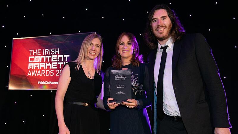 Sara Kennedy, Awards Judge presents the Most Effective Use of Illustration award to Michaela Simpson & Joe Griffin, Wolfgang Digital.