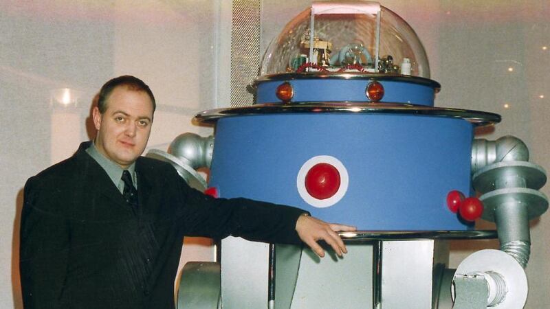 “I’ve wiped the tapes”: Dara Ó Briain with Shredder the robot from the gameshow It’s a Family Affair. Photograph: RTÉ