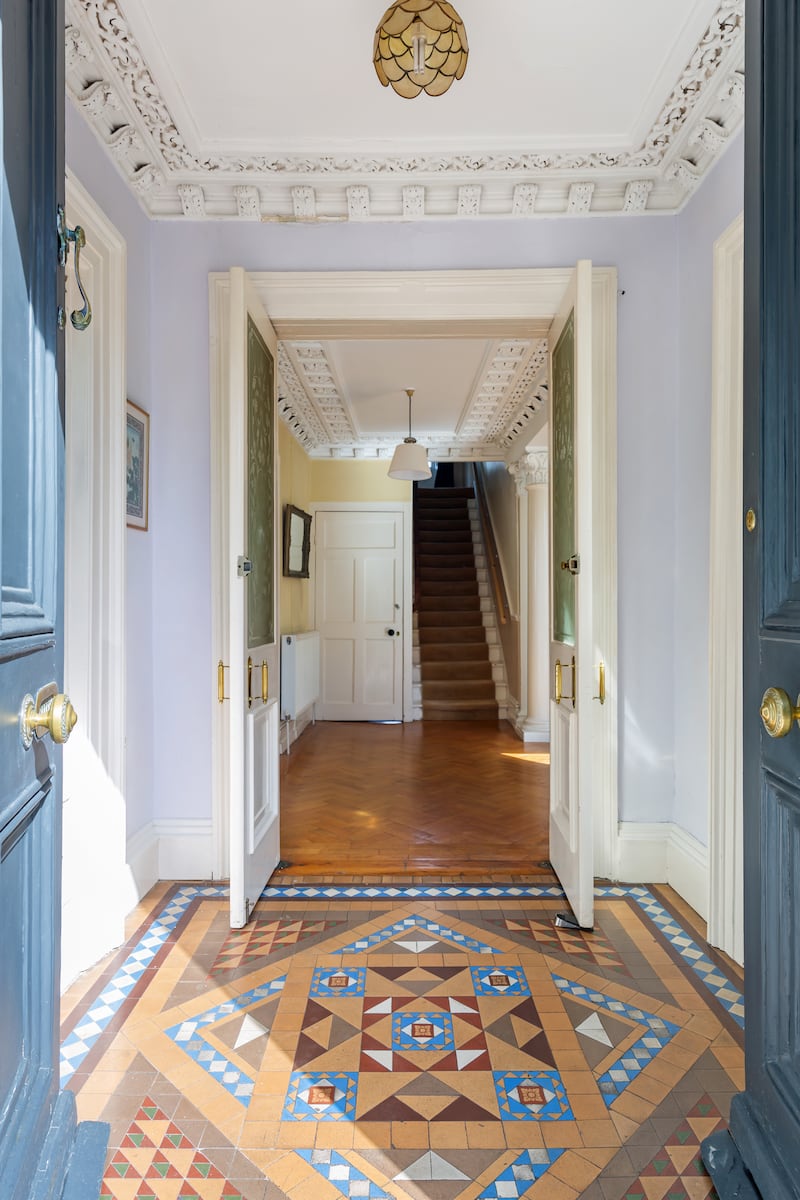 The front porch has a superb ceiling