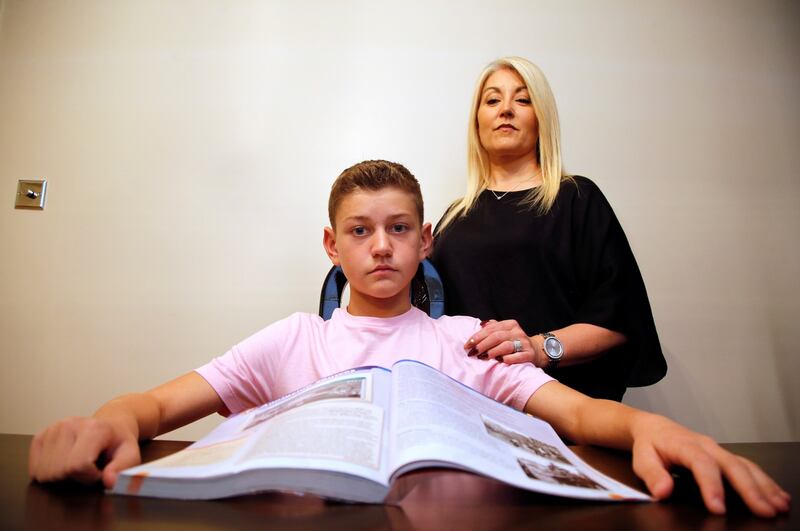 Wendy Doherty with her son Tyler who brought the new ‘Making History’ text book home Photograph Nick Bradshaw/The Irish Times
