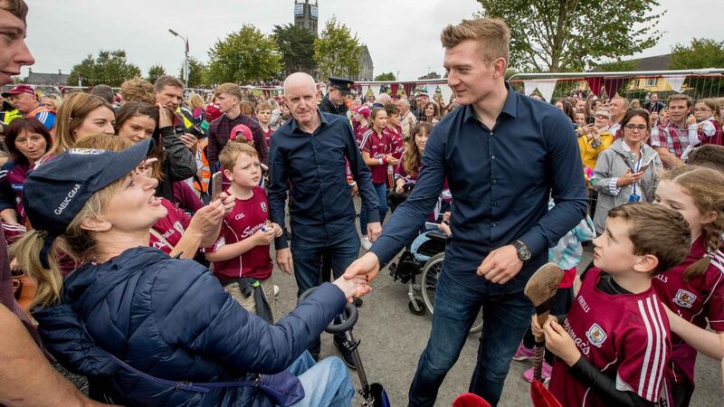 Supporters greet their hero Joe Canning. He  has quipped that at least now the lack of an All-Ireland medal won’t be used as a stick to beat him with. Photograph: Morgan Treacy/Inpho