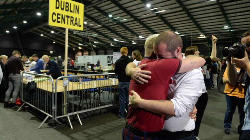Michael Barron, founder of Belong To, with Jaime Nanci at the count centre at the RDS as results in the same-sex marriage vote emerge. Photograph: Cyril Byrne