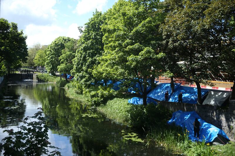 Asylum seekers pitch tents along Dublin's Grand Canal. Photograph: Stephen Collins/Collins Photos