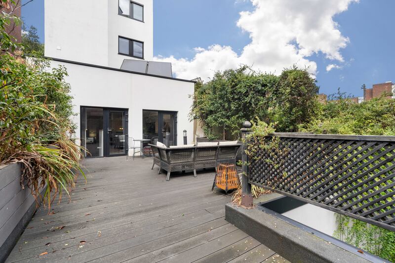 The unit has a 58sq m deck off mezzanine level 