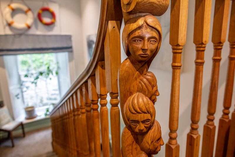 A local woodcarver carved the Children of Lir on the newel of the stairs, in the Manor House. Photograph: Paul Faith