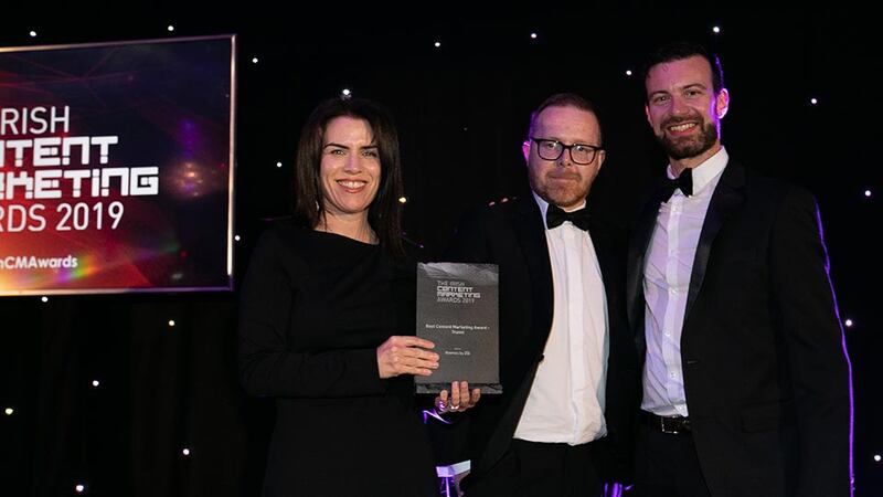 Dr Tara Rooney, Awards Judge presents the Best Content Marketing Award - Travel to Brendan McGinley, 256 & Alessandro Boscolo, Roomex.