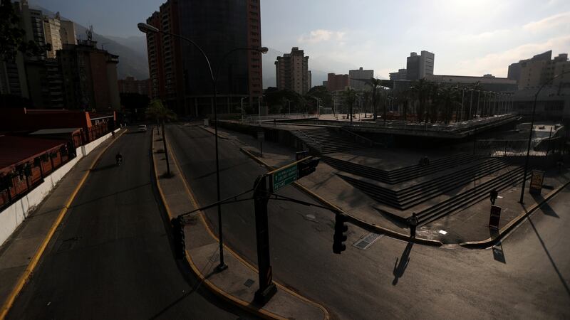 Commercial area during a blackout in Caracas, Venezuela. Photograph: Ivan Alvarado/Reuters