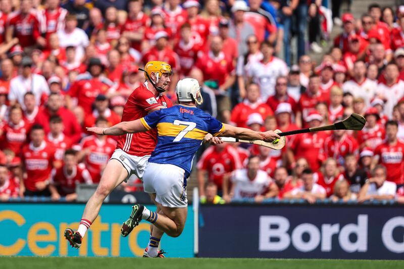 Cork's Shane Barrett scores a goal despite desperate Tipp defensive work. Photograph: Bryan Keane/Inpho 