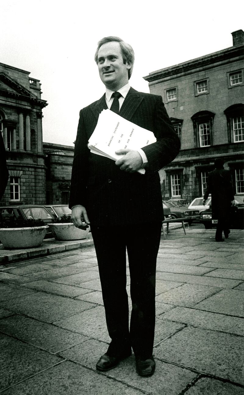 1982: John Bruton on the Dáil plinth before going into the House to announce the imposition of vat on shoes as part of the budget. As a result of this Jim Kemmy withdrew his support and the government fell. Photograph: Eamonn Farrell/RollingNews.ie