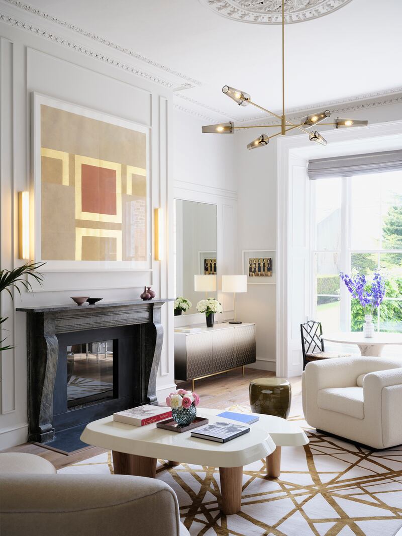 Maoliosa Murray’s showroom apartment with lacquered coffee table and brown table from The Invisible Collection. Patrick Scott artwork from Stoney Road Press, cabinet by Bethan Gray. Photograph: Simon Watson